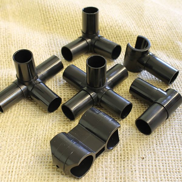 Fruit cage connectors on a piece of hessian