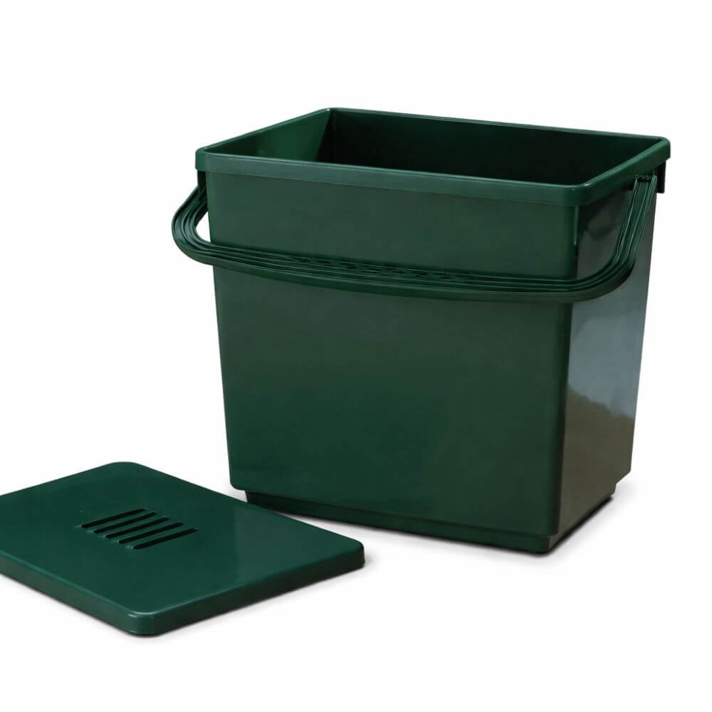 Green plastic food waste bin with a lid on a white background