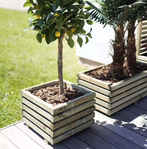 Cube garden planter wooden in garden