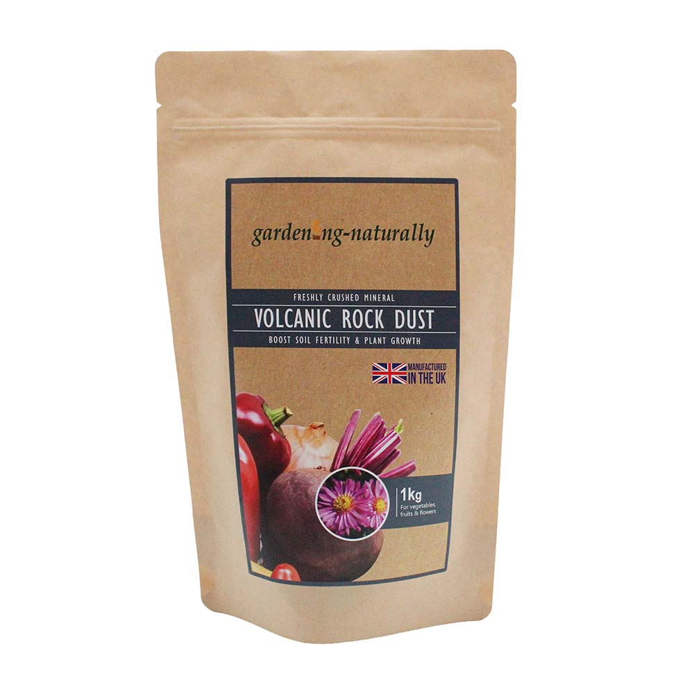 1kg tub of volcanic rock dust soil improver with loose rock dust shown.