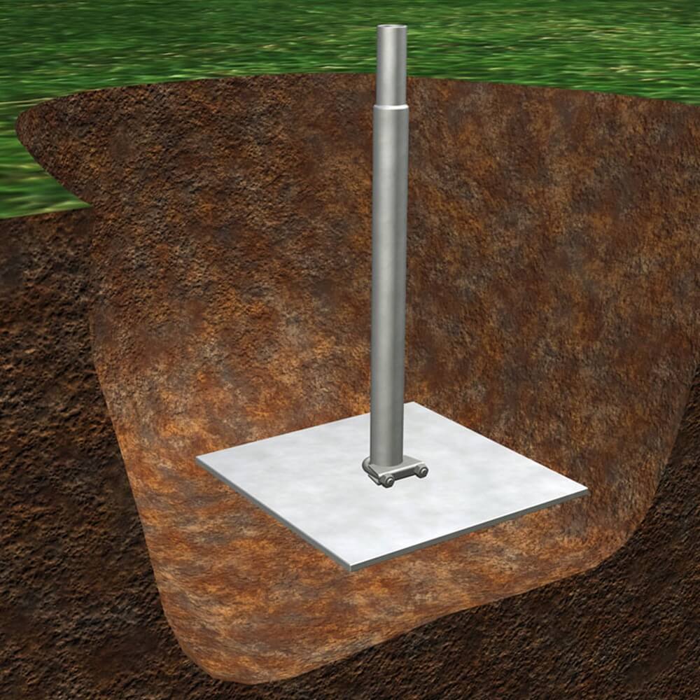 Metal pole with base plate embedded in soil