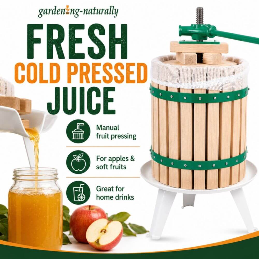 A wooden cold press juice maker with green metal bands and a green hand crank, shown on a white stand with juice being poured into a glass jar and apples nearby. Large text reads 'FRESH COLD PRESSED JUICE' with feature icons for manual fruit pressing, apples/soft fruits, and home drink use.