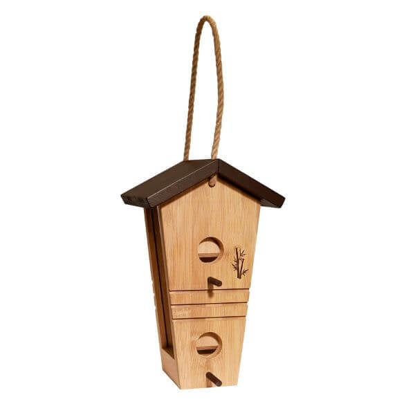 A tall bamboo bird feeder with a chocolate brown roof and perches, equipped with a jute rope for hanging.