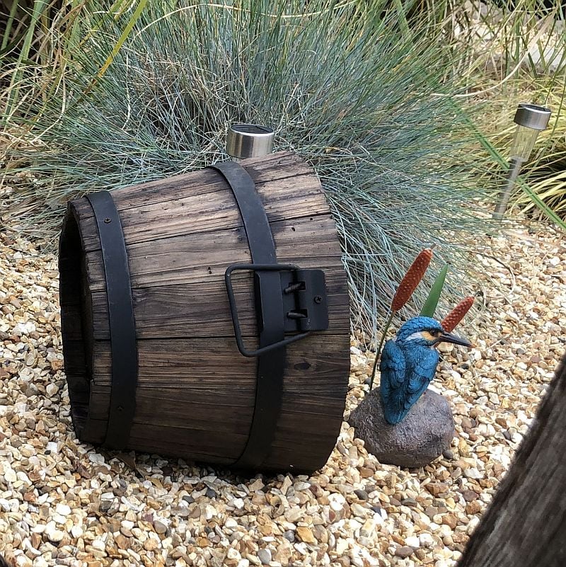 Barrel garden planter on side
