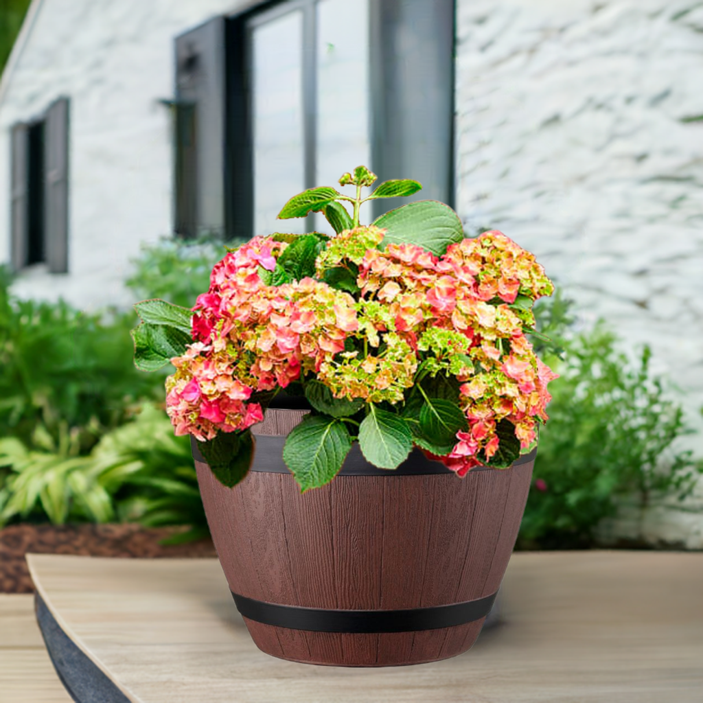 Wooden barrel planter with flowers in