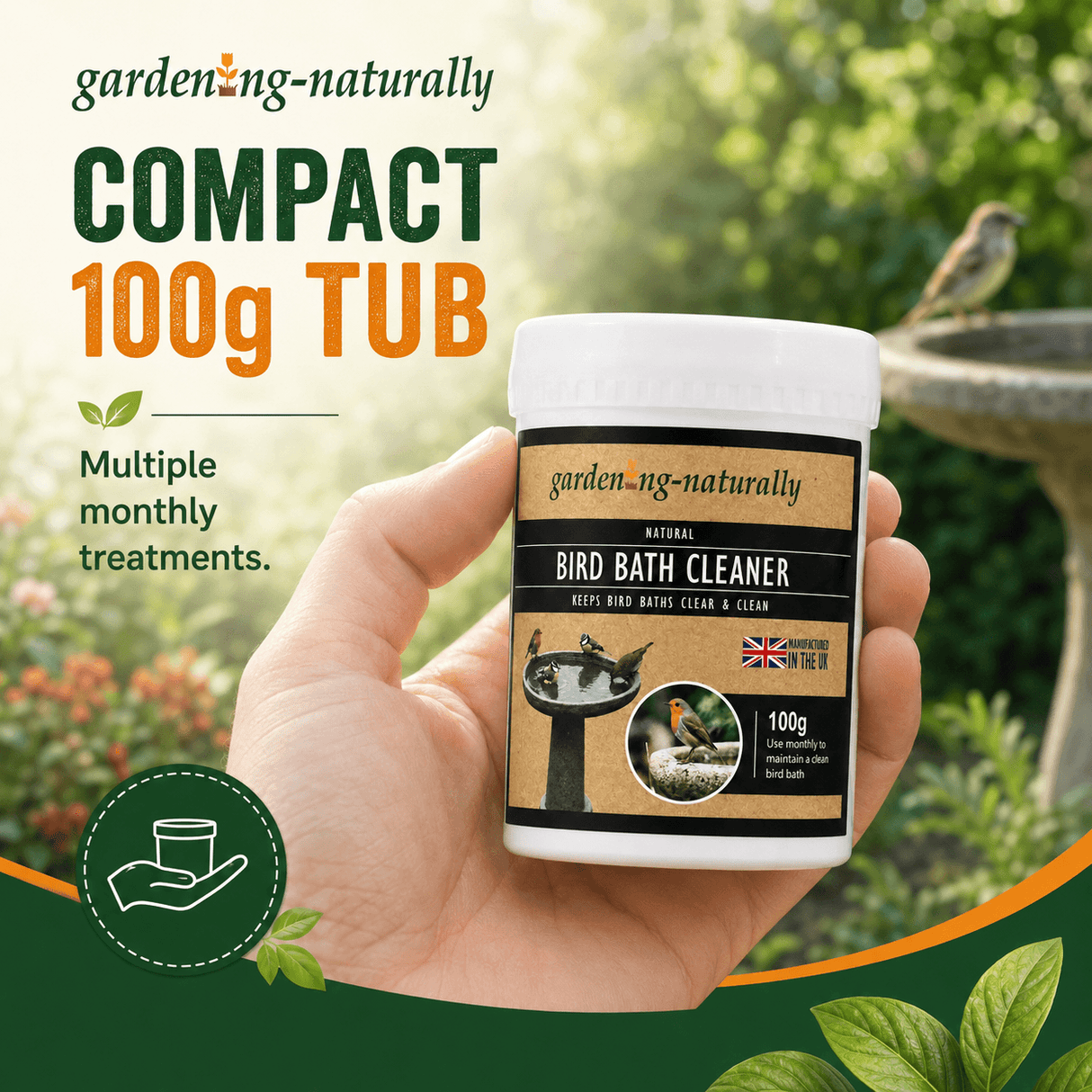 A hand holding a white tub of garden-ng-naturally Compact 100g Bird Bath Cleaner against a blurred garden background with a birdbird and birdbasin.