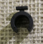 A single black hoop clips