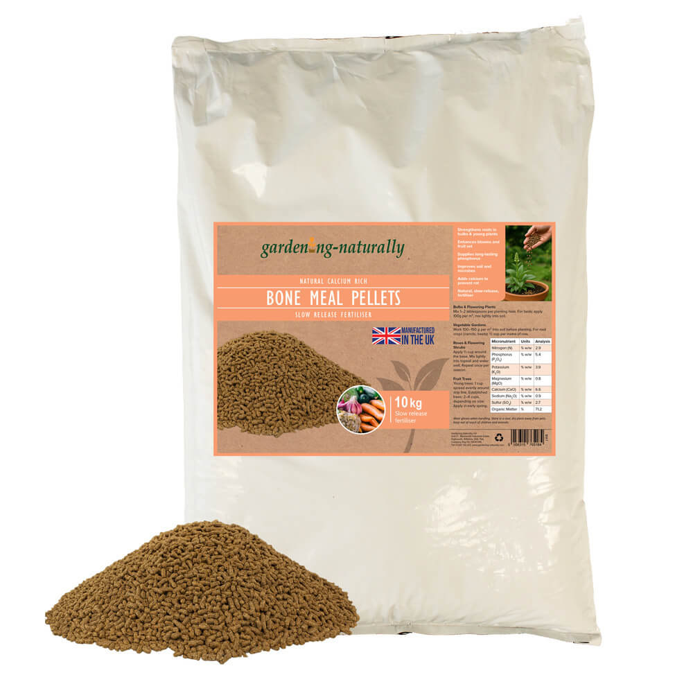 Bag of gardening-naturally bone meal pellets with a small pile of pellets in front on a white background