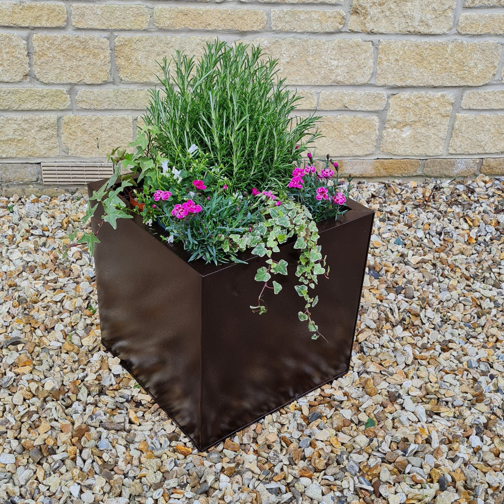 bronze black aluzinc planter in garden