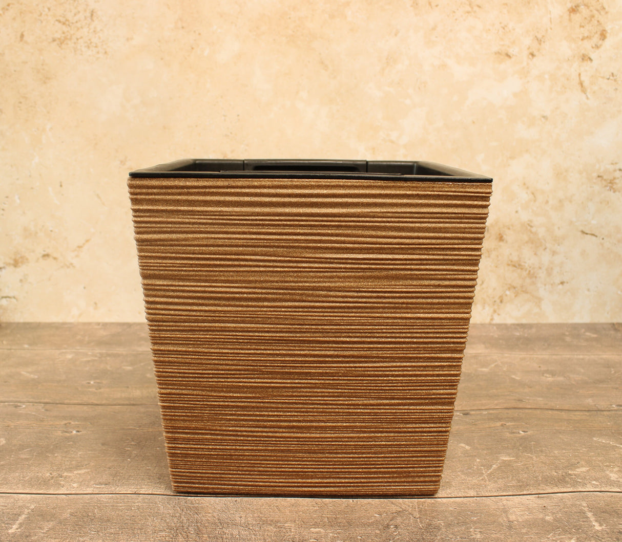 Brown square plant pot with a horizontal ribbed textured finish