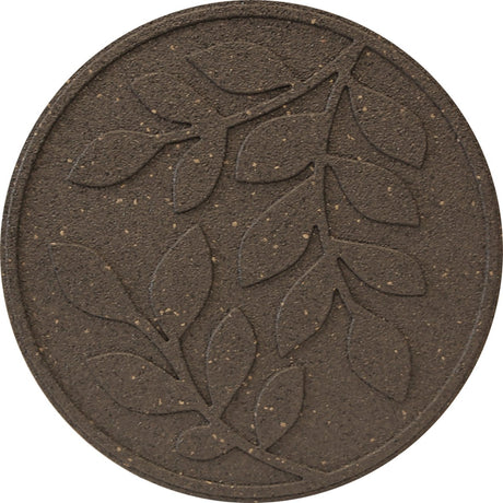 A circular brown stepping stone with a large imprinted leaf design in the center.
