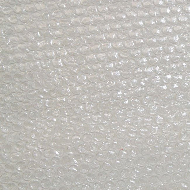 Close-up of a white bubble wrap used for greenhouse insulation.