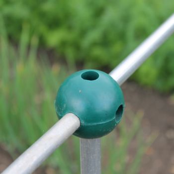 A green solid rubber build a ball on aluminium poles