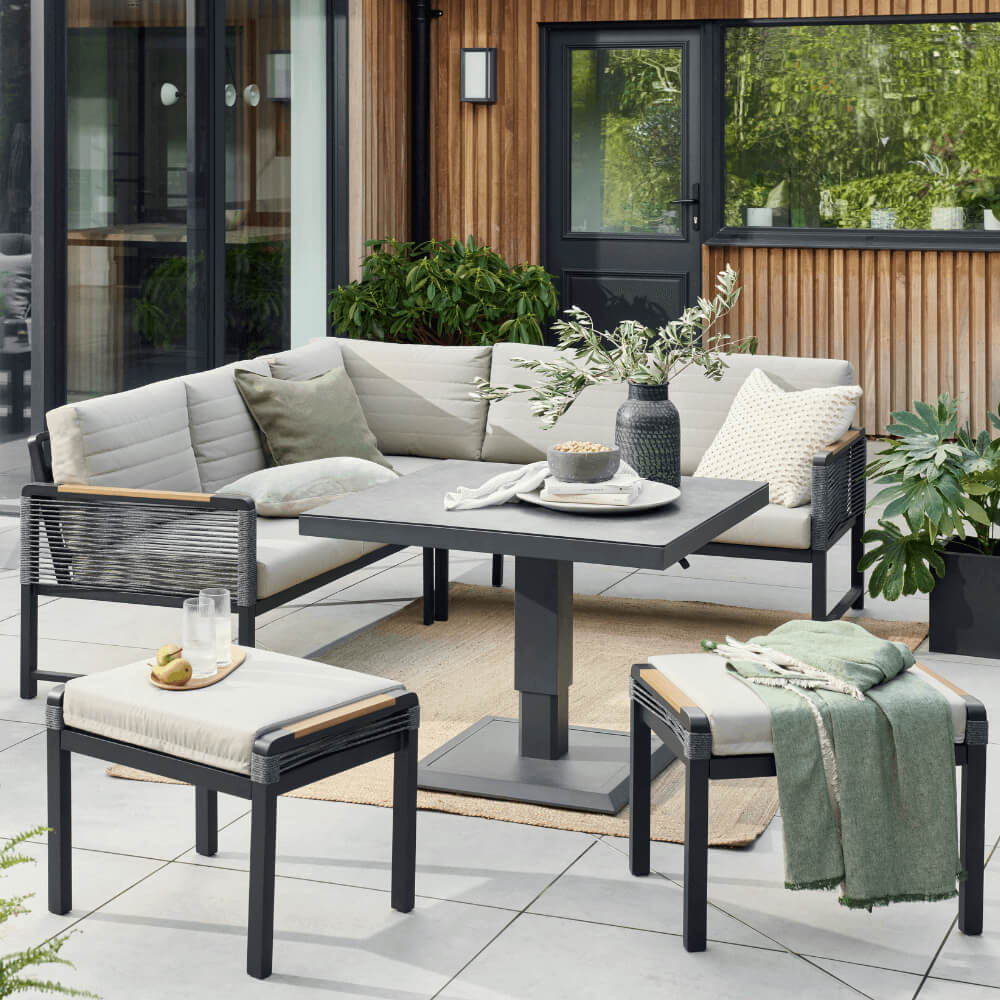 Outdoor garden set featuring big cushions and good decoration, perfect for outdoor gatherings