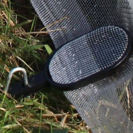 Crop cover clips on netting