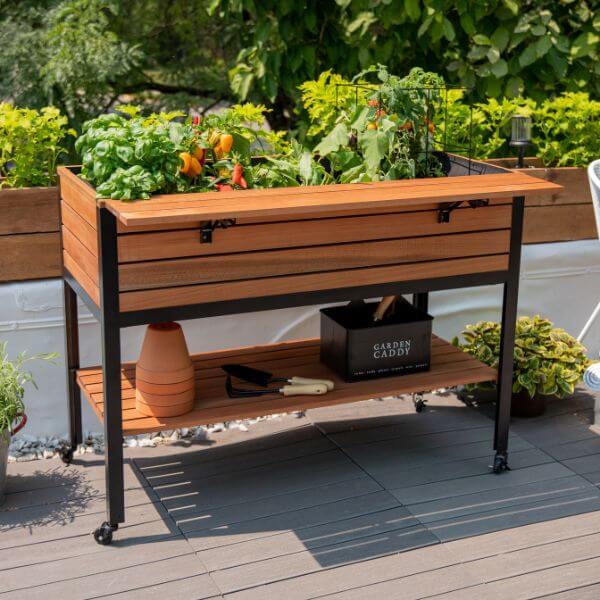 A Raised garden wooden planter bed with shelf