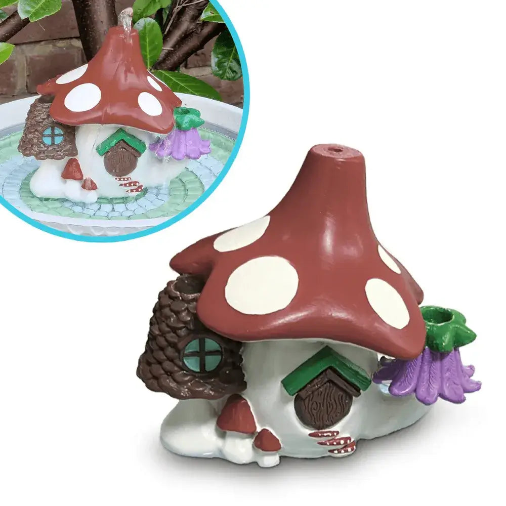 Fairy house with mushroom-shaped roof for fountain