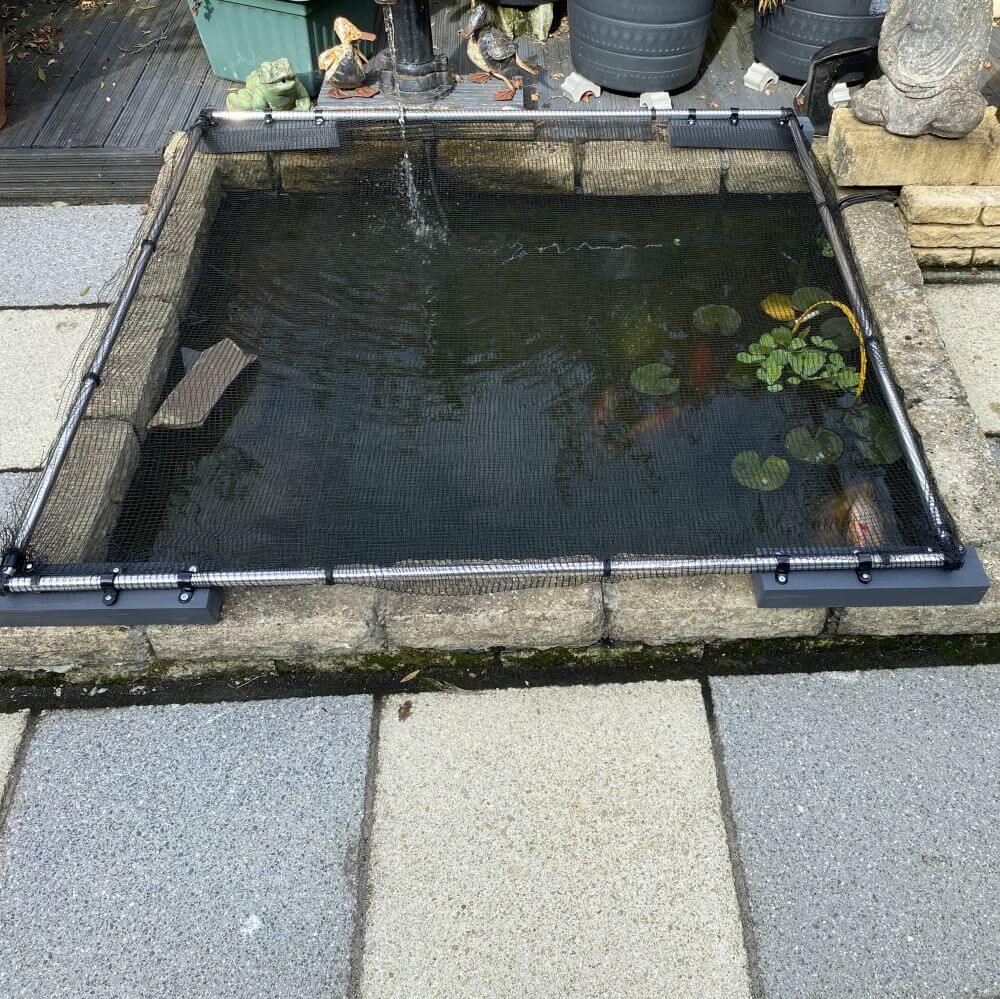 Koi pond with a cover on a patio