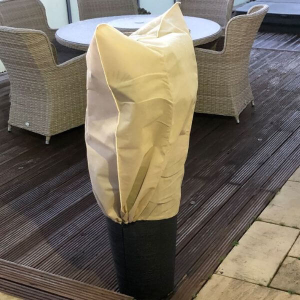 Fleece Bags over potted plants on decking