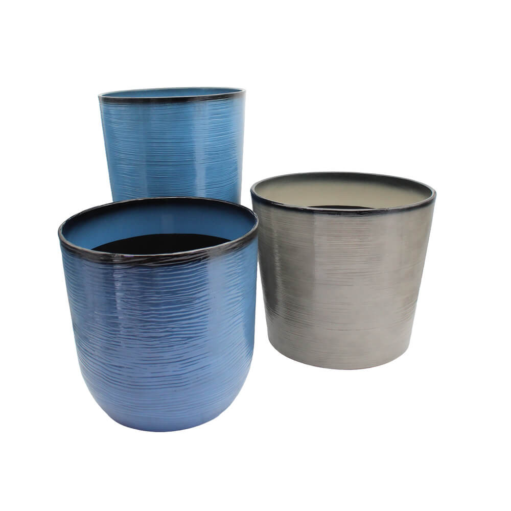 Three blue and gray ceramic planters on a white background