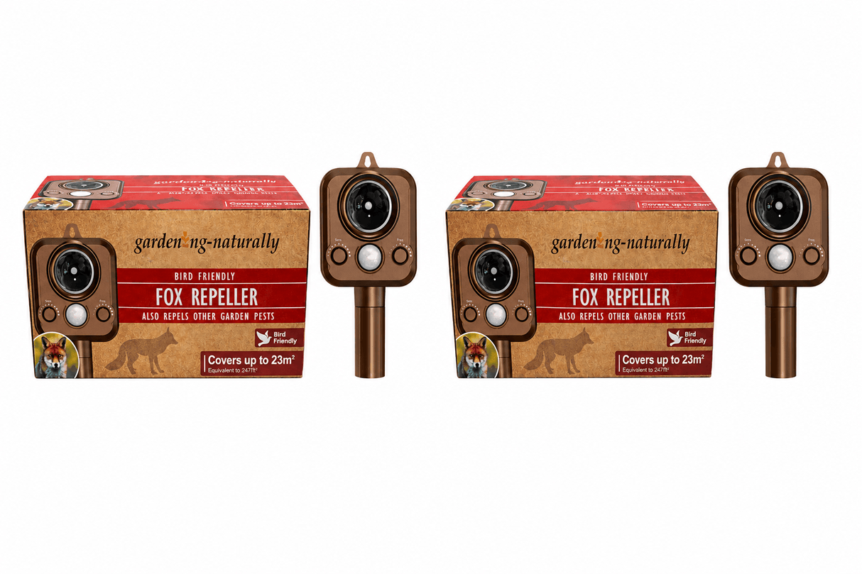 Two fox repellent devices with red and brown packaging on a white background