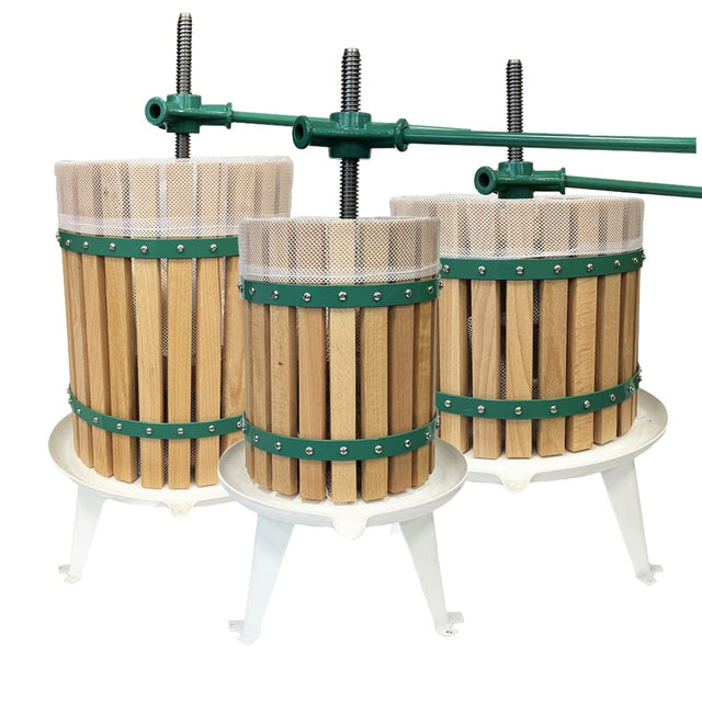 Three sizes of manual wooden fruit presses with metal accent