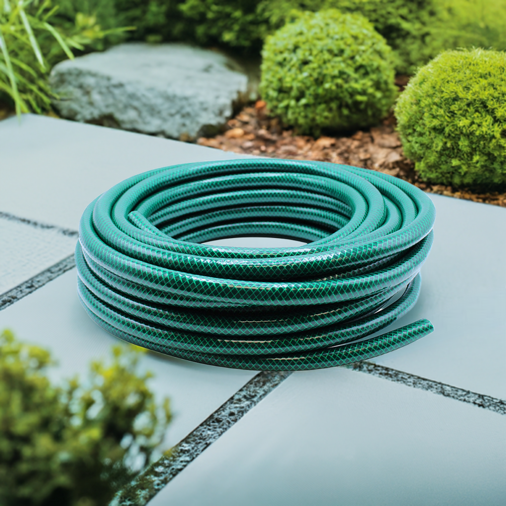 green hose pipe in garden