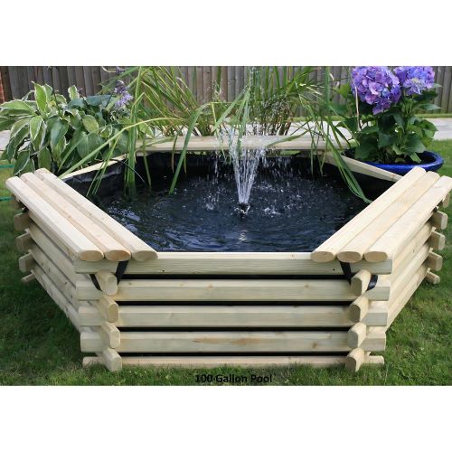 Patio pond wooden with fountain in garden on lawn