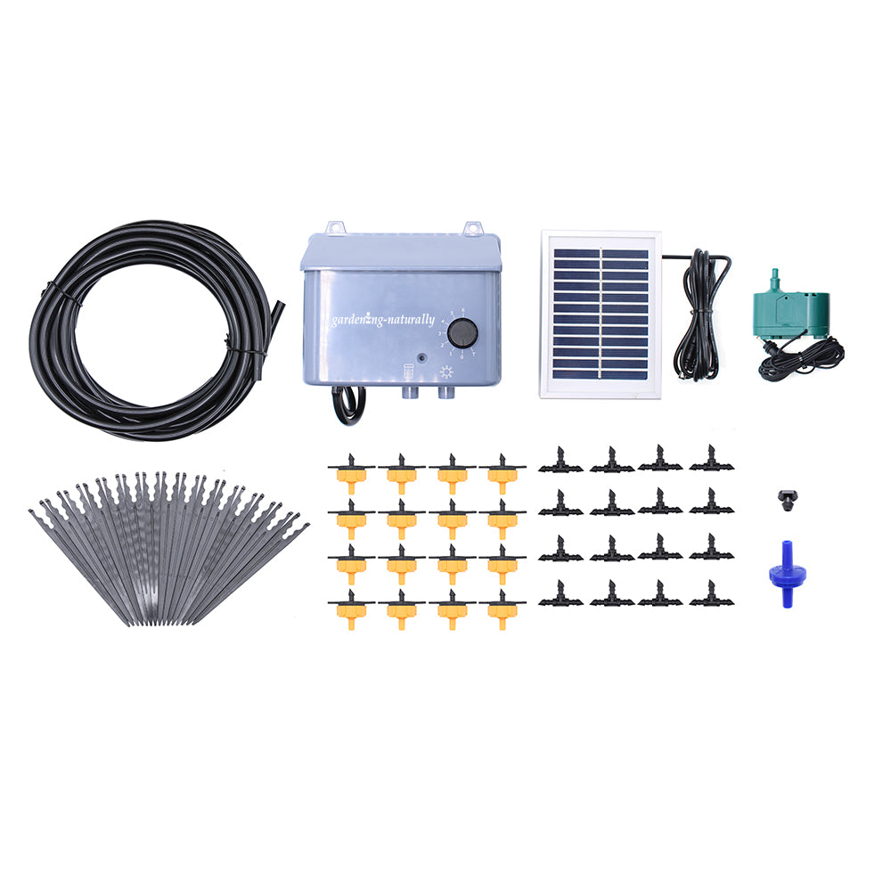 Components of a solar-powered automatic plant irrigation system including a solar panel, a controller box, black hoses, and various drip irrigation nozzles.