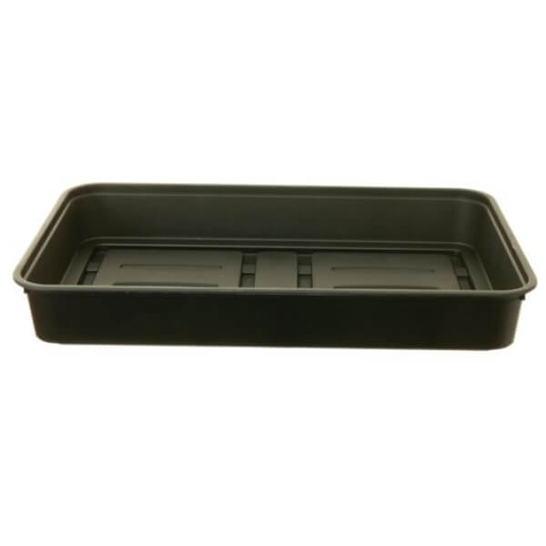 A black plastic gravel tray for gardening, viewed from a slightly elevated angle, showing the interior with drainage holes.