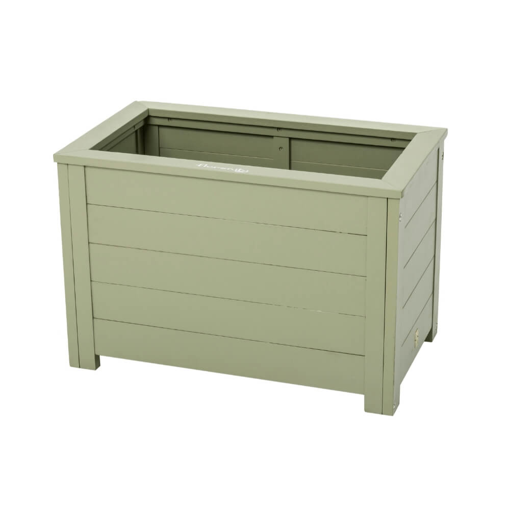 green wooden trough planter on white background