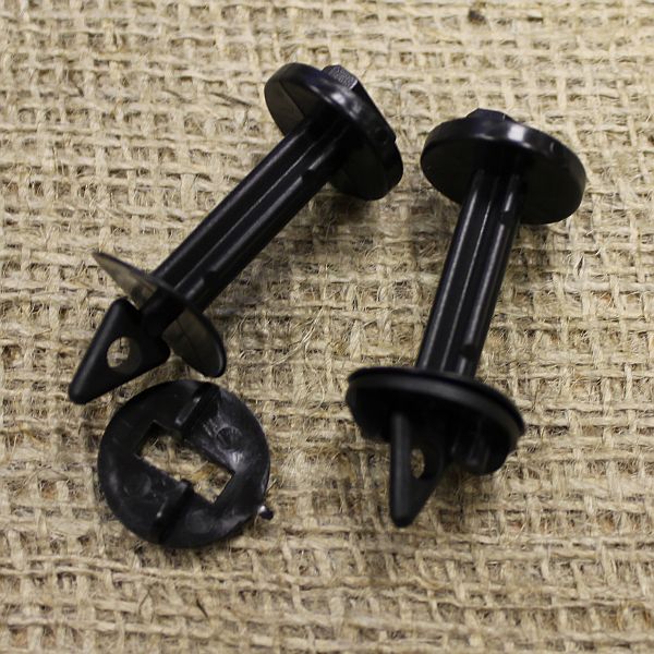Two black greenhouse insulation clips