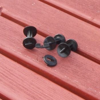 Two black metal greenhouse insulation/shading clips