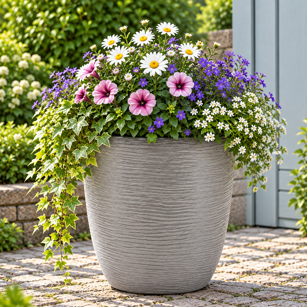 Grey pot with flowers outside