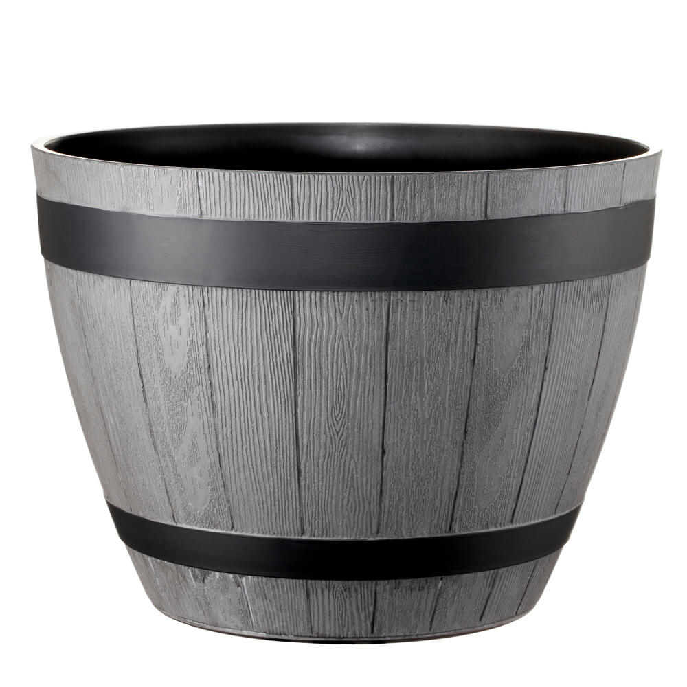 grey wooden barrel for plants
