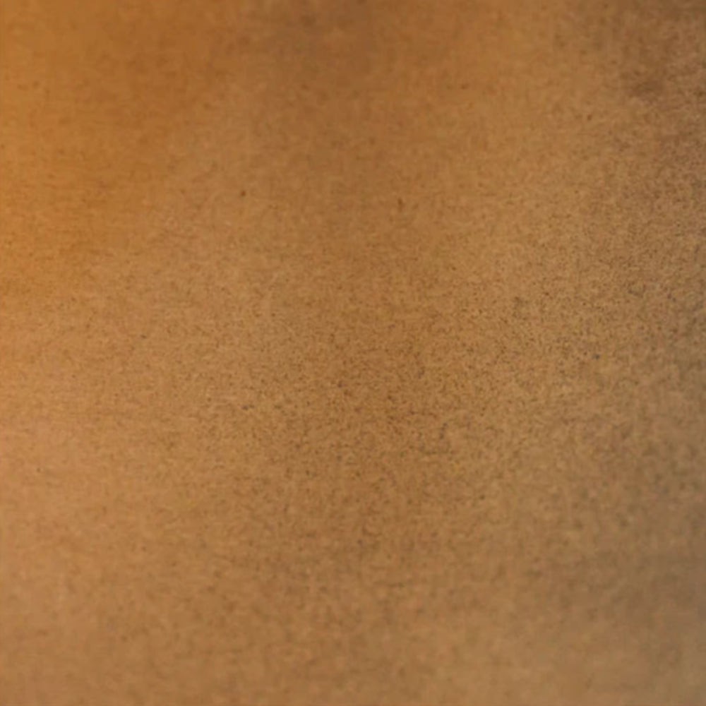 close up of the copper metal plant pot