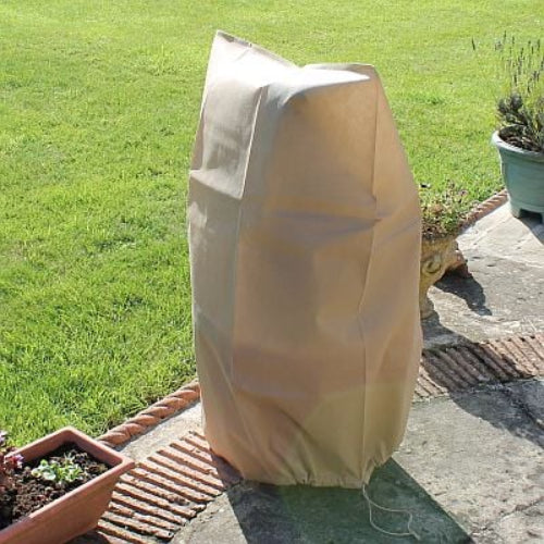 Two beige fleece bag jackets covering potted plants