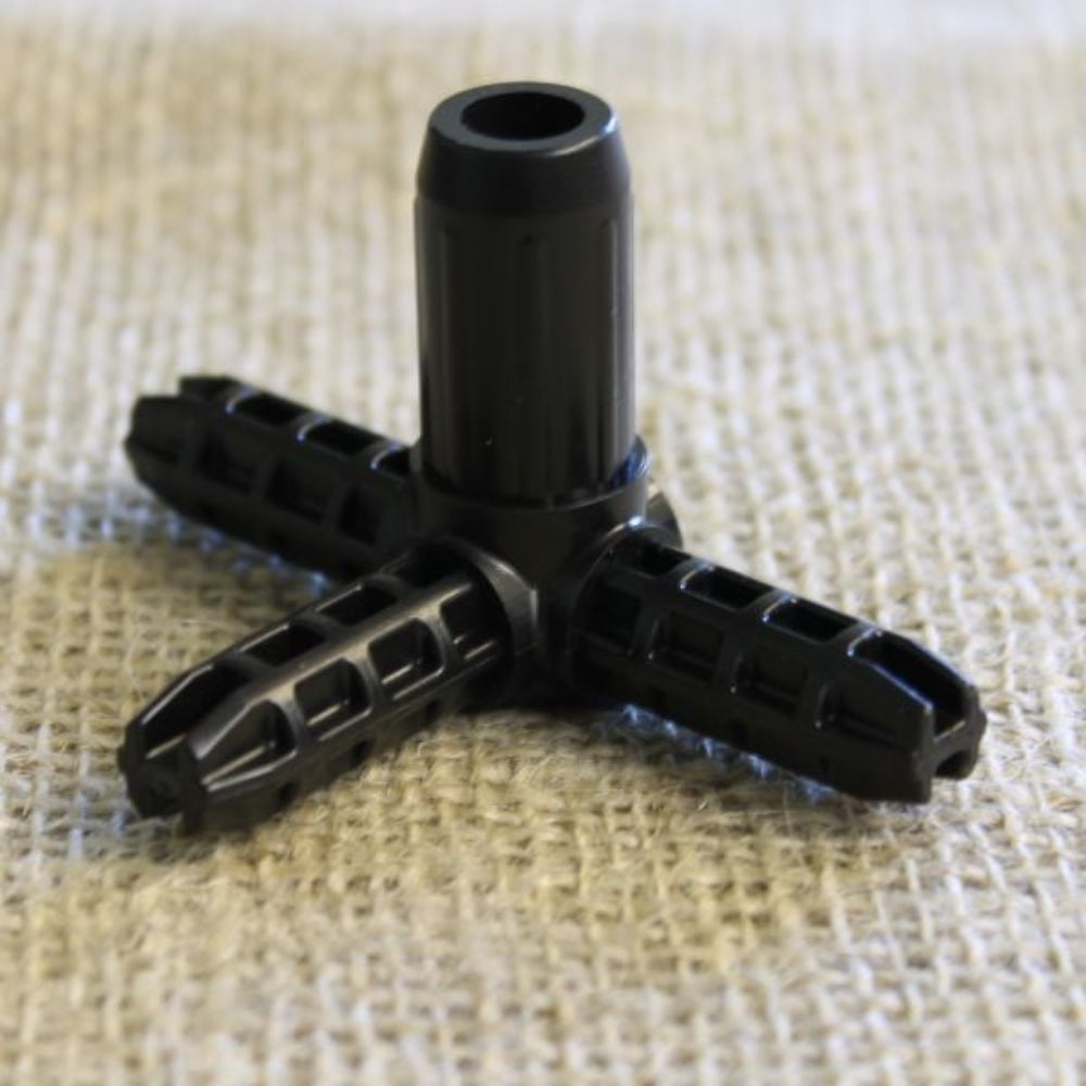 A black metal tee joiner for fruit and vegetable cages