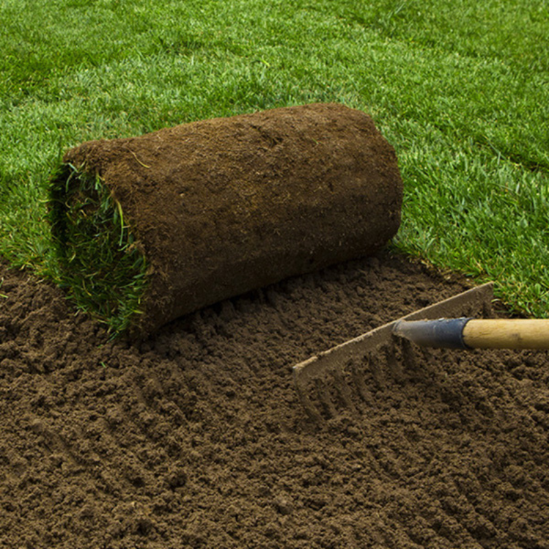 A Roll of lawn turf and topsoil