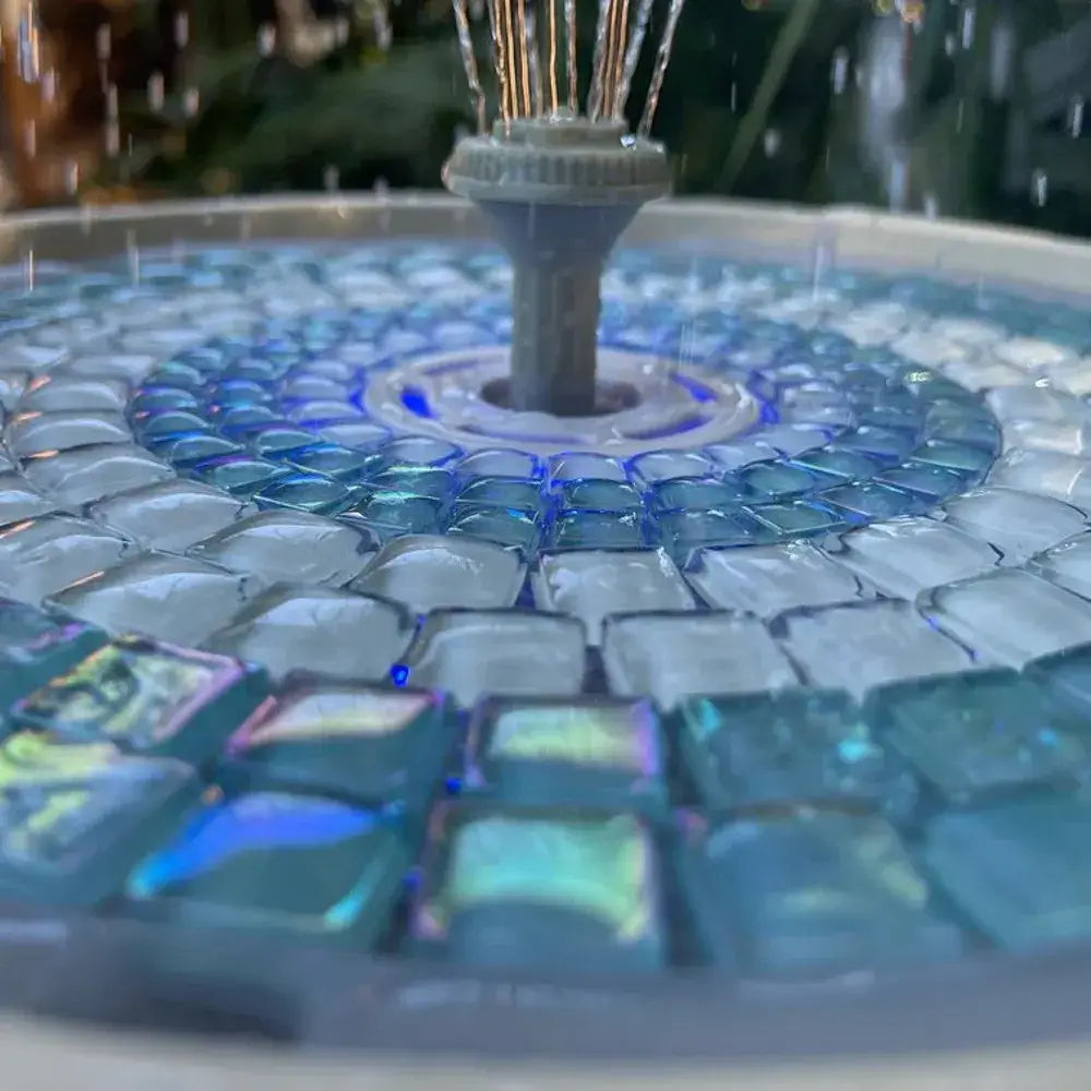 Mosaic fountain with glass tiles and water feature