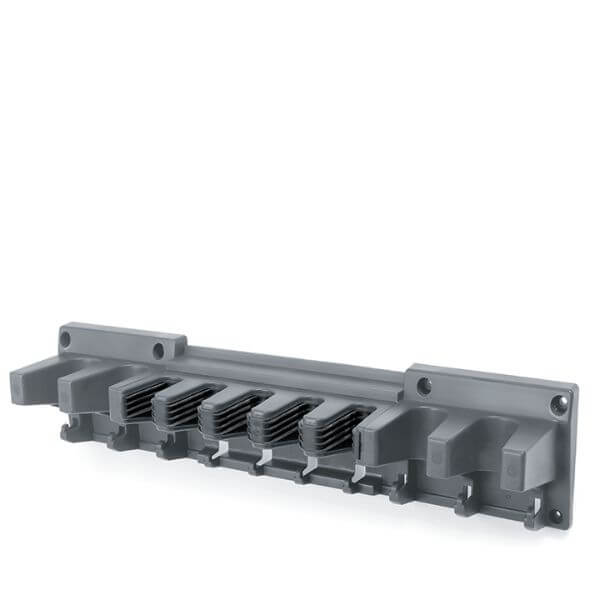 Garden tool holder mounted to a white wall, no tools