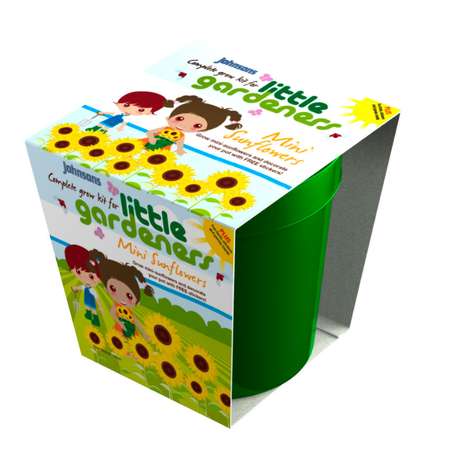 A packaged mini sunflower grow pot kit with illustrations of children and sunflowers on the label, including a green plastic pot.