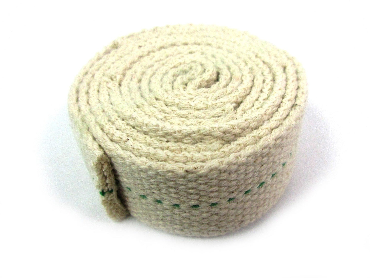Paraffin heater wick rolled up on white background