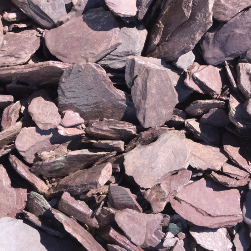 Plum coloured garden slate in a pile