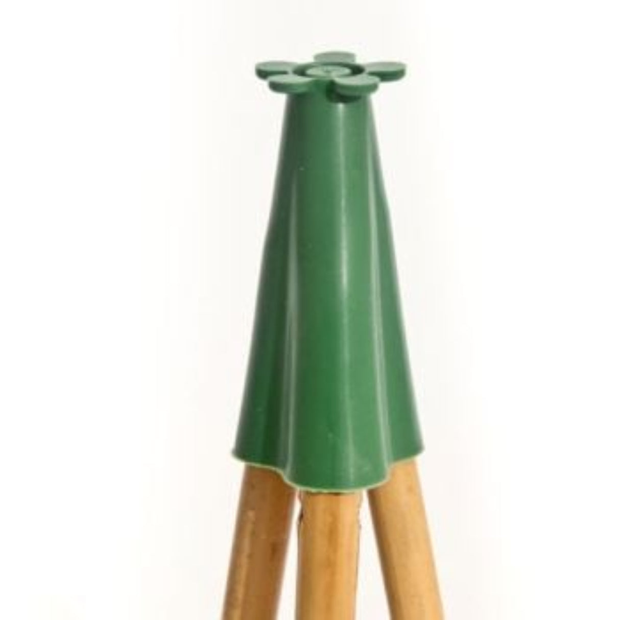 A green plastic pyramid cane cap fitted over a wooden tripod base.