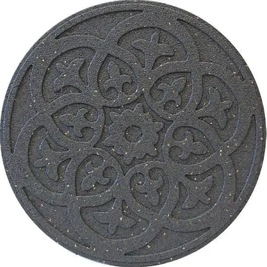 A round grey stepping stone with a reversible scroll design