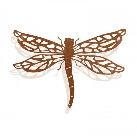 A rusted metal wall art in the shape of a dragonfly with intricate cut-out wings.