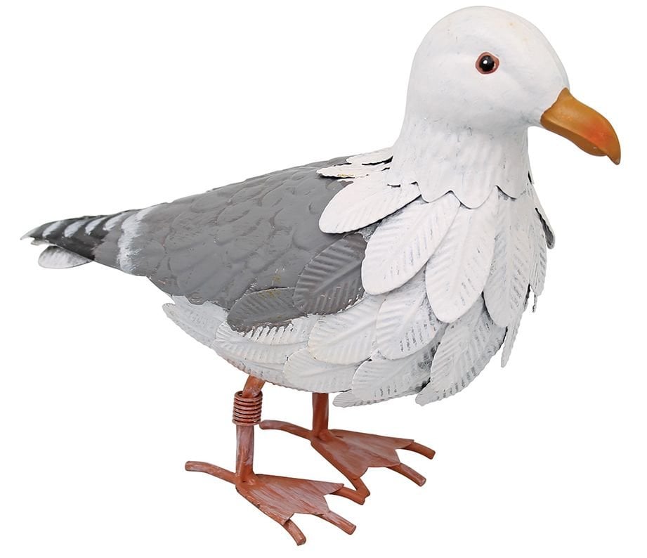 A decorative metal seagull with gray wings, a white head, and a yellow beak standing on a base.