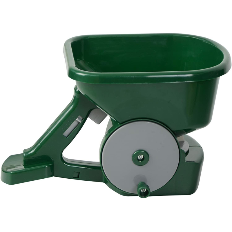A green and grey handheld seed and fertiliser spreader with a capacity of 3 liters, featuring an extending forearm support and a rustproof hopper.