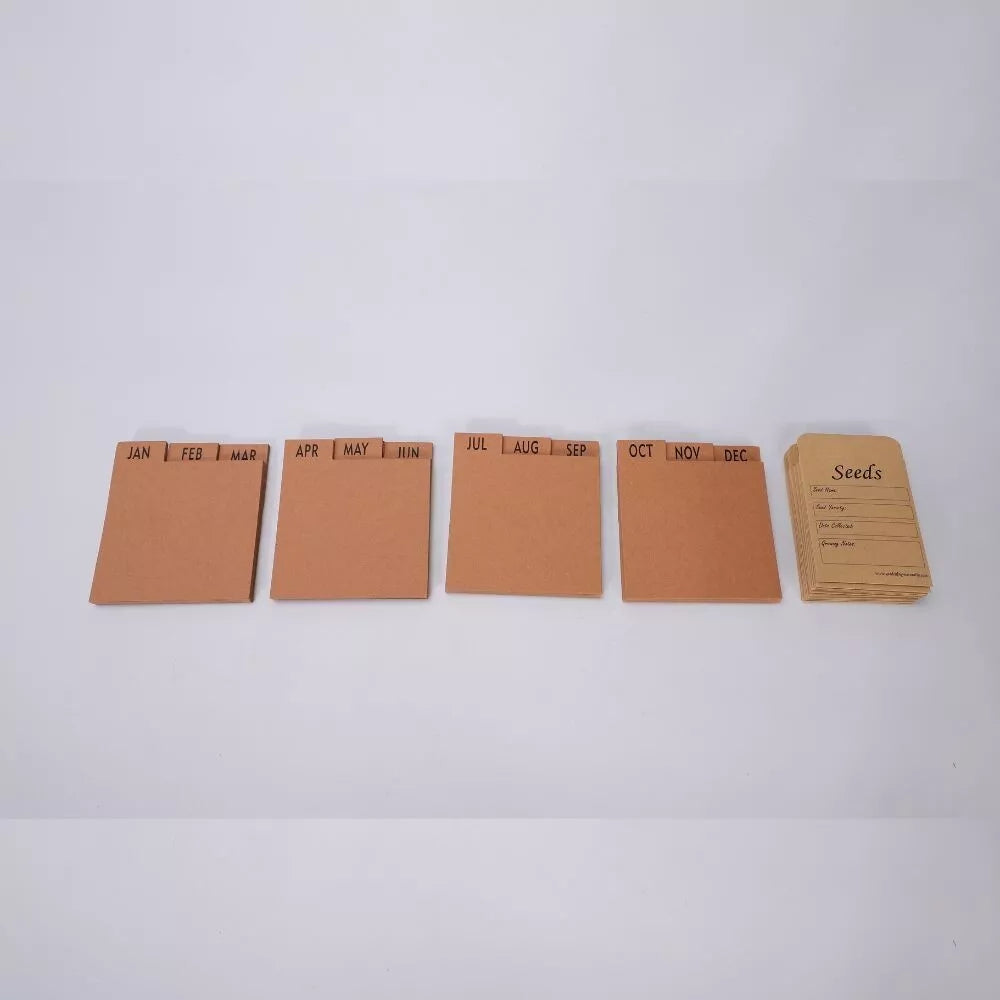 Set of brown paper pads with month labels on a white background